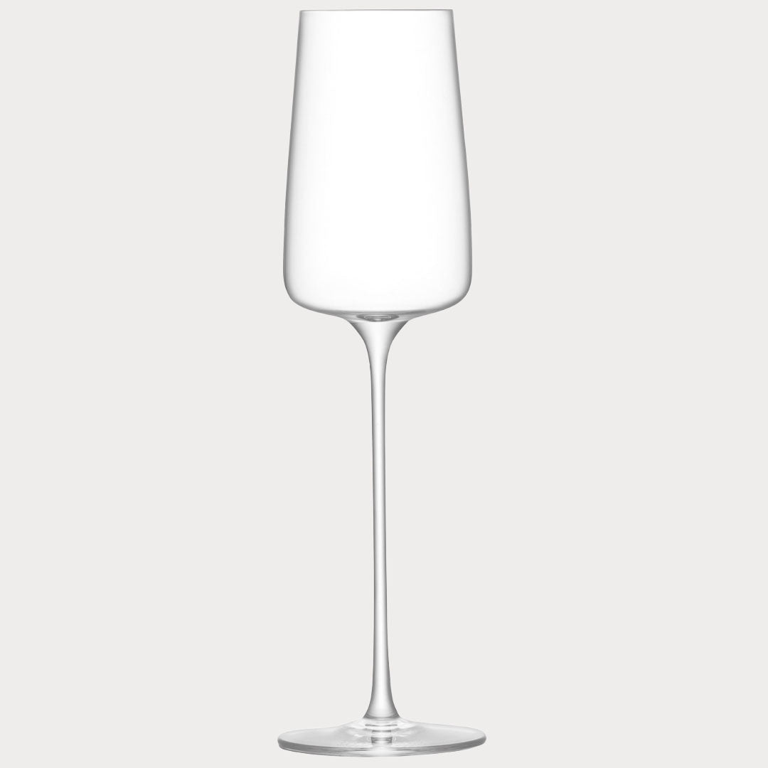 Close-up of a hand-blown champagne flute showcasing its unique craftsmanship.