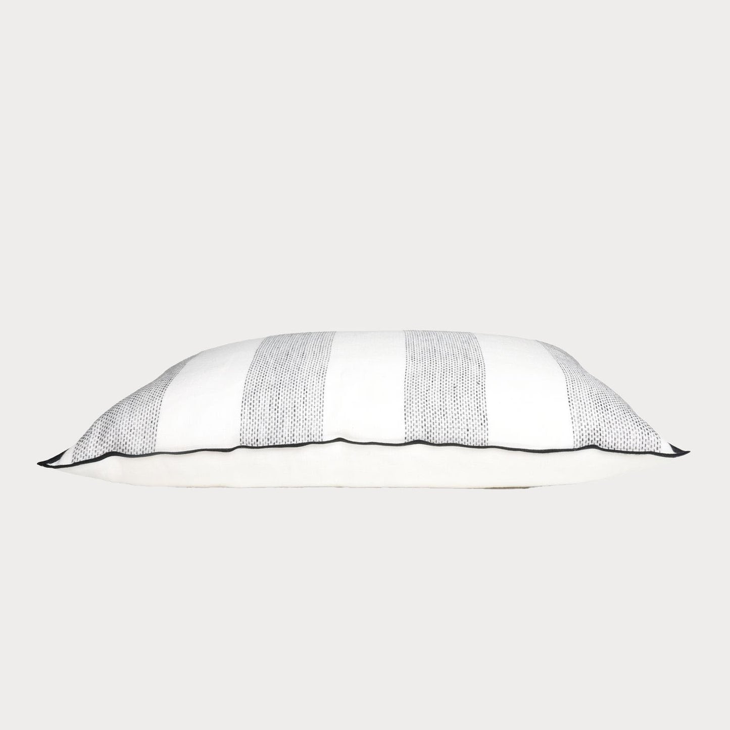 Side view of the cushion highlighting its texture and classic stripe pattern.